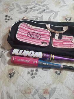 Girls Bat Bag And Bats. Louisville Slugger bag black with pink/white Accents.