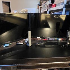 Black L-Shaped Desk with a Hutch and Drawers