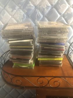 50 cds no certain titles in cases