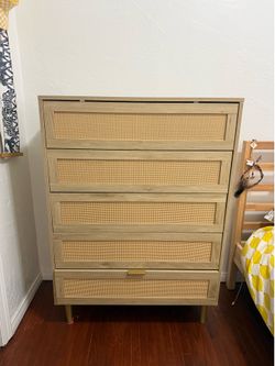 Tall natural wood dresser