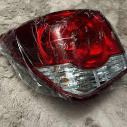 Chevy Cruze 2009 To 2014.  Passenger Rear Tail Light”. Door Handle Insert Accents Never Used  Both For !   $80. Or I Can Sell Them Separed”””.     OBO