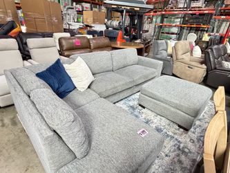 Grey fabric Sectional with ottoman from Costco