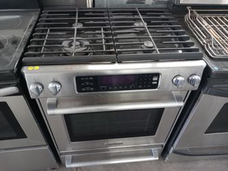 KitchenAid stainless steel 4-burner dual-fuel slide-in range - Free delivery