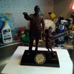 Disney clock walt disney holding mickeys hand