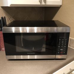 Frigidaire 1100 watt microwave- Last Pic Shows Plastic Cover Still Over Function Buttons