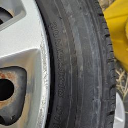 Set of Tires with rims and OEM Nissan Wheel hubs
