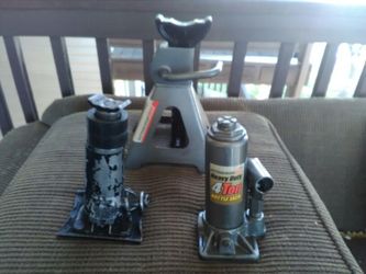 Two bottle jacks and a Jack stand