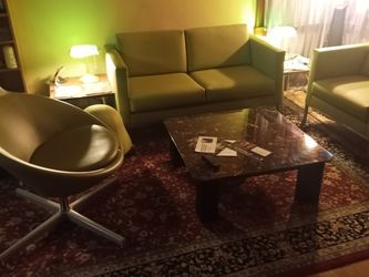 Fairly Used Sofa With Two Side Tables.