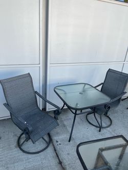 Small patio table and chairs (in store)
