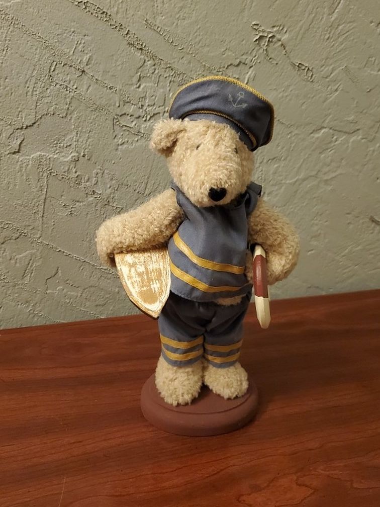 Nautical Bear Holding A Boat And Life Saver Floater