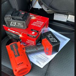 3/4 inch snap on impact with 2 batteries and new charger never been used 