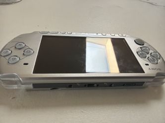 Sony PlayStation Portable (PSP-3000) in Mystic Silver (PSP-3001 in North America). It