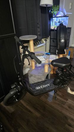 Electric sit down scooter