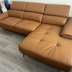 New Leather Match Reversible Sectional.  106” X 65”.  Mustard.  Free Delivery!