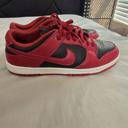 red-ish black panda Nike dunks 
