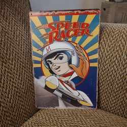 SPEED RACER METAL SIGN.  12" X 8".  NEW.  PICKUP ONLY.