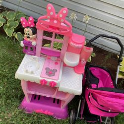 A Dolls House, With A Matching Stroller For The Dolls To Have Fun With The Children (NO SHIPPING)