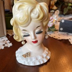 Napcowear Lady head vase With Pearls Gold Earrings from the 1950s.