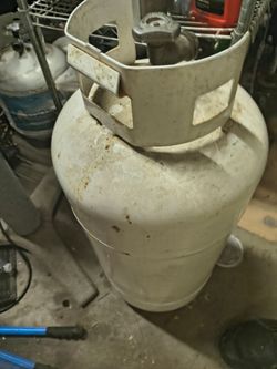 Large tall propane tank with some gas left