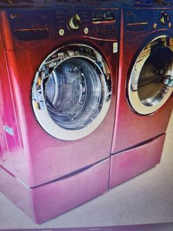 LG RED STEAM WASHER AND ELECTRIC OR GAS DRYER WITH PEDESTALS