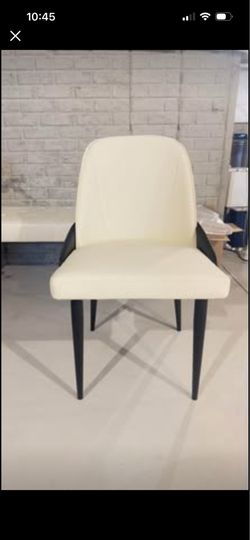 Modern white,leather upholstered dining chair like new