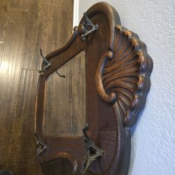 Antique Coat rack with mirror.
