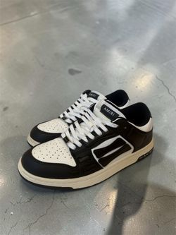 AMIRI Skel Low Top Sneakers in Black and White Leather