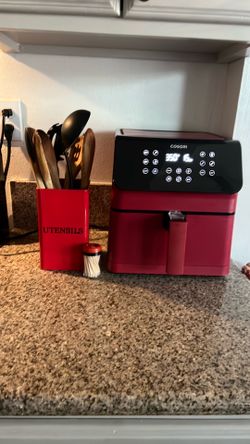 Air fryer and red utensil holder