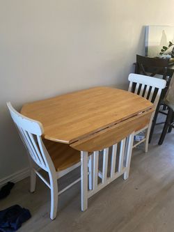 Expanding table and chairs