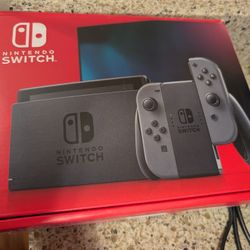 Nintendo Switch With Gray Joy Cons 