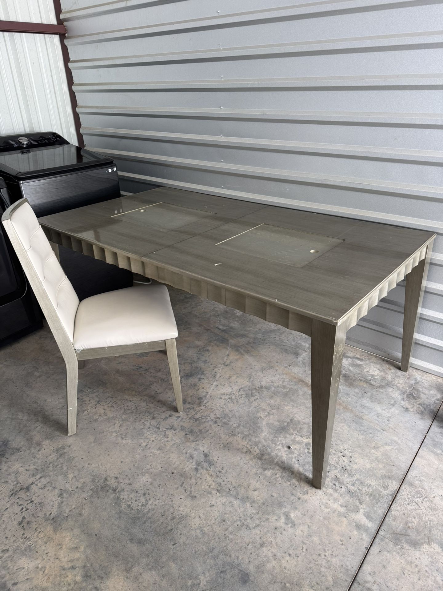 Dining room table with 4 chairs.