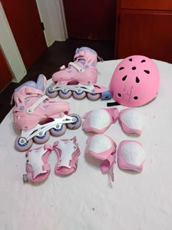 Girls Size small inline skates, helmet, and pads all for