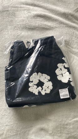 Large black denim tear shorts