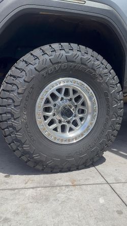 KMC GRS 17x9 8x180 WITH 37 12.50 17 TOYO RT TRAIL