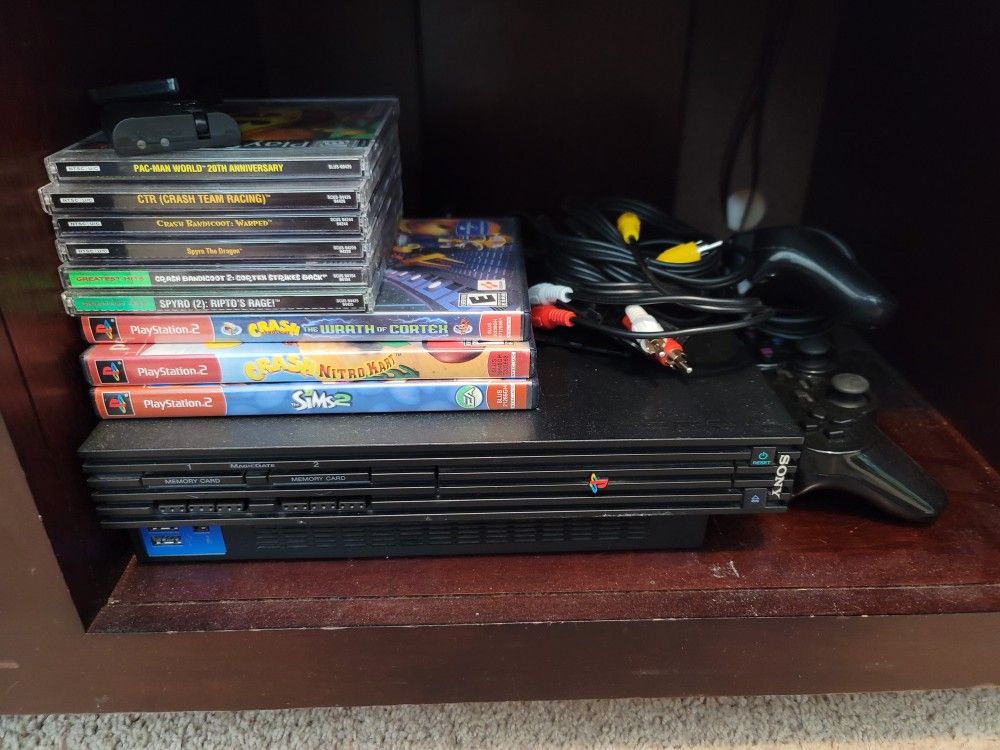 Playstation 2 + Goodies
