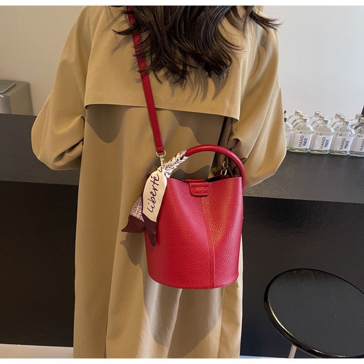 Red faux leather purse