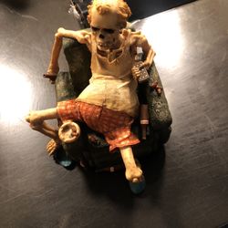 Couch Potato Skeleton On A Recliner