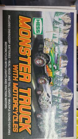 Toy monster truck with motorcycles