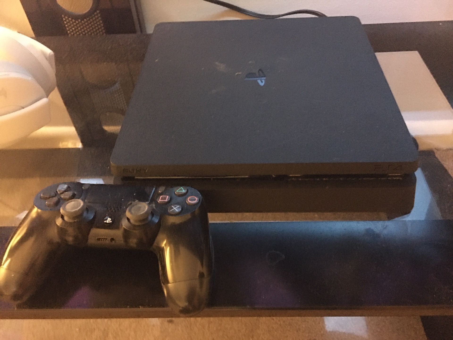 Ps4 Slim comes with 1 controller and NBA 2k19