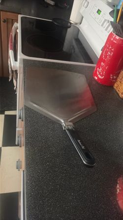 Checkered chef pizza peel new but out of box