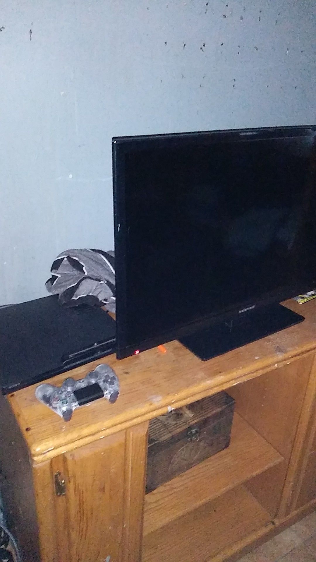 Emerson TV and PlayStation 3 with controller