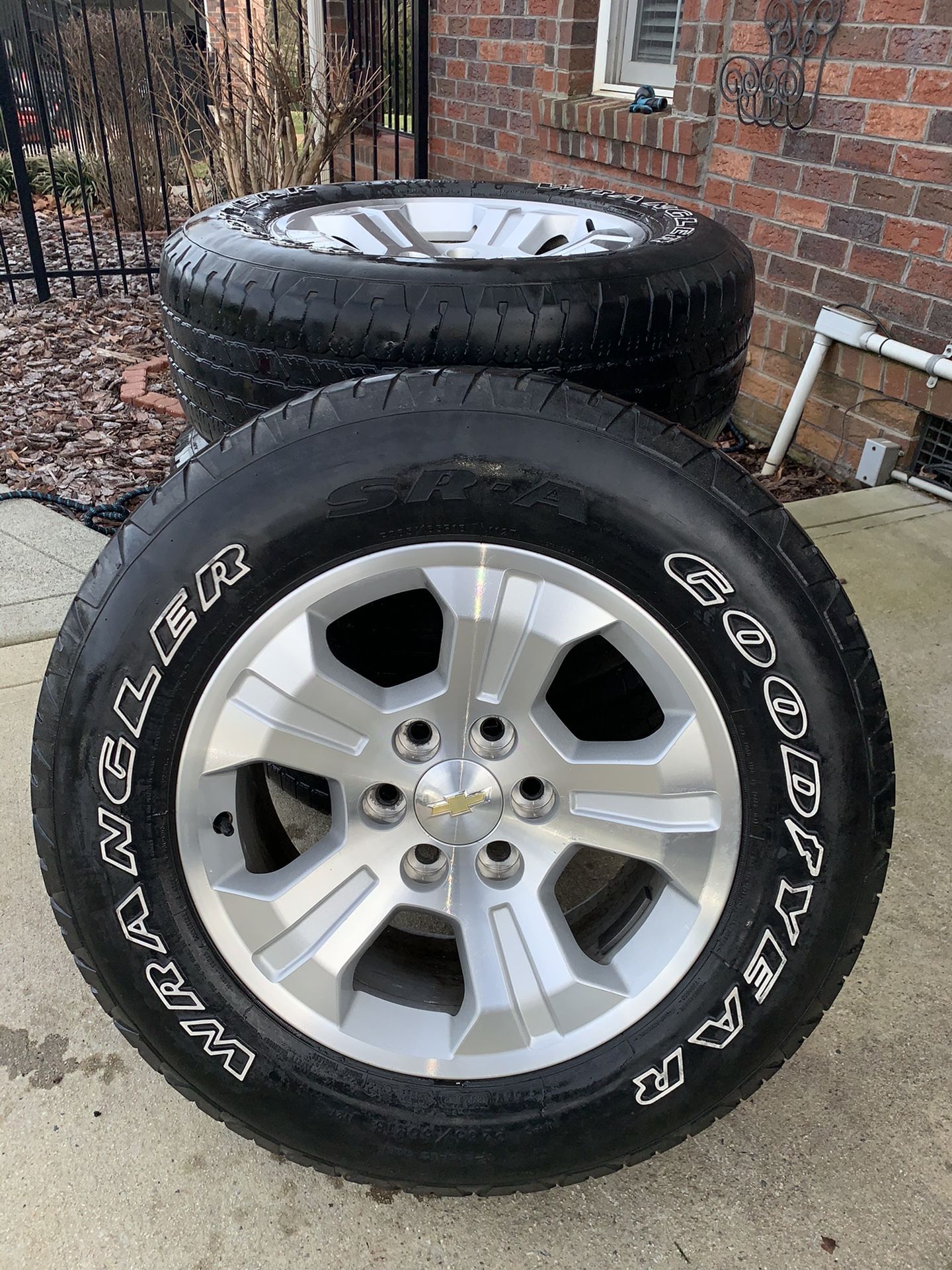 2015 Chevrolet Silverado stock Rims and tire set of 4( p265/65r18) Rims in pristine condition Tires still have a good amount of tread