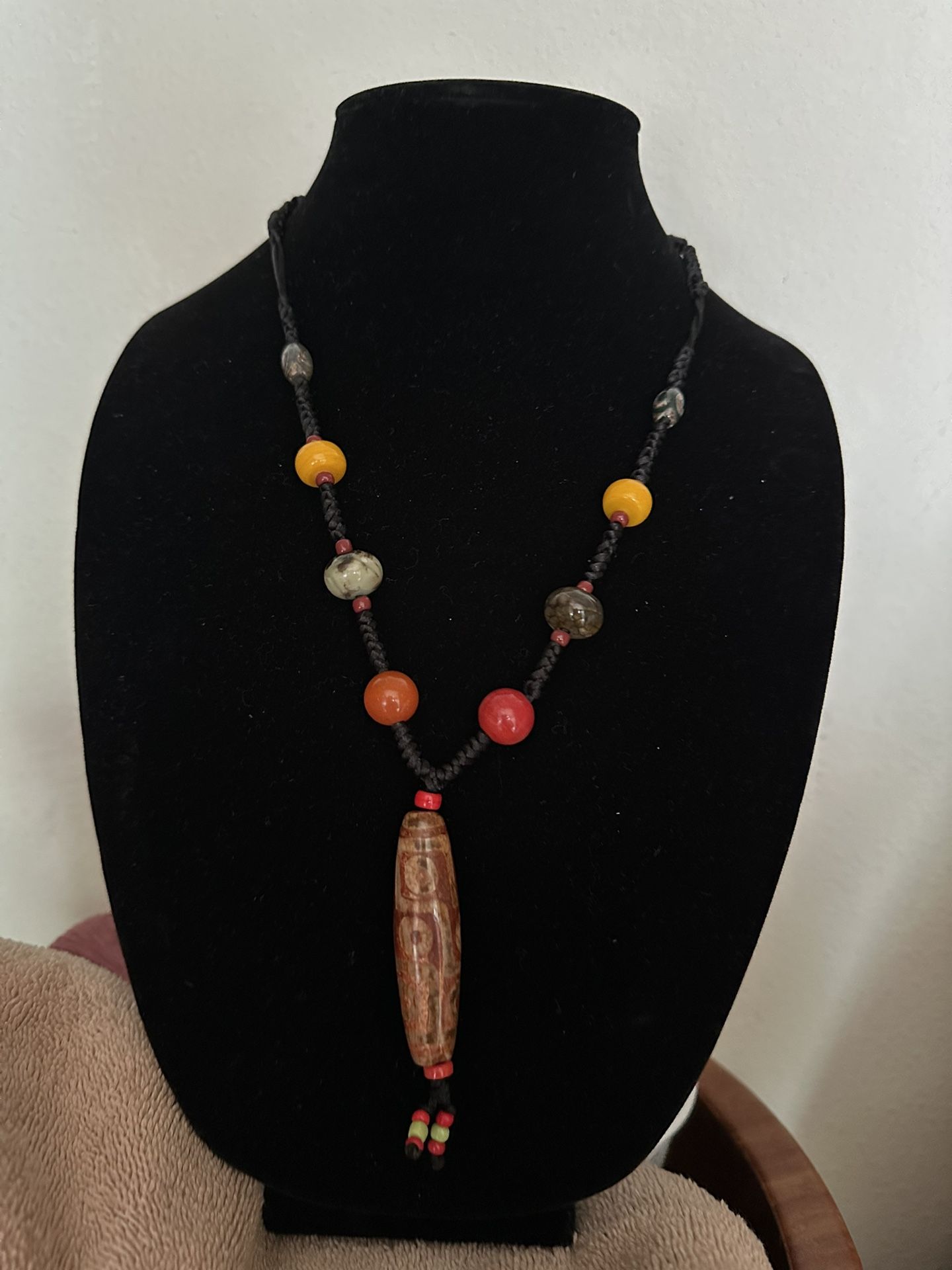 Tibetan dzi necklace man, and woman’s