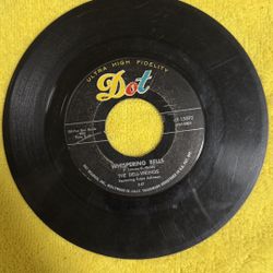 This is a 1957 Dot Records 45 RPM vinyl single by The Dell-Vikings. 