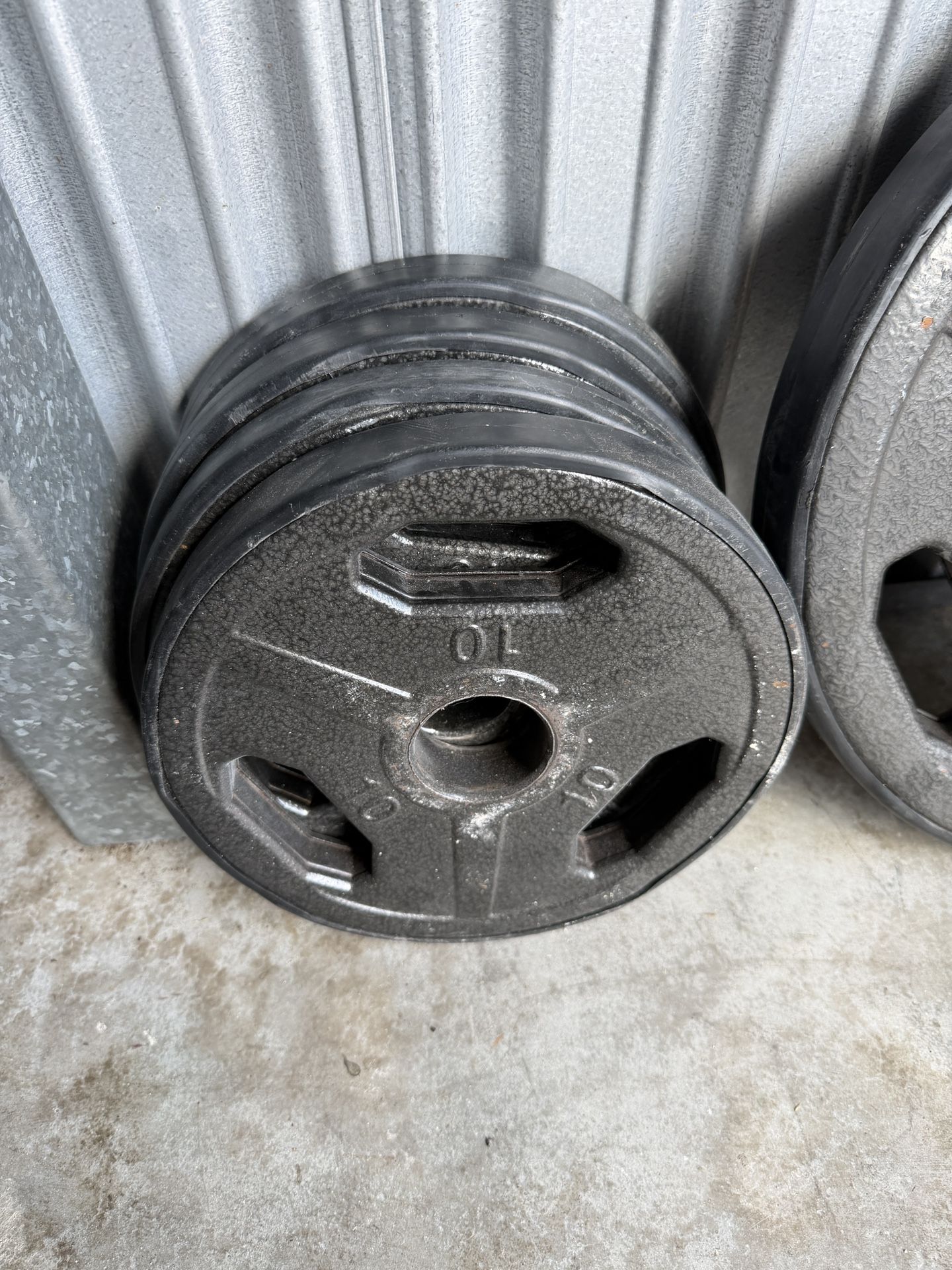 Four 10lb Sand Weight Plates