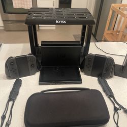 Nintendo Switch Version 1, Includes All 8 Games + 4 Joy Cons + Case And Charger 