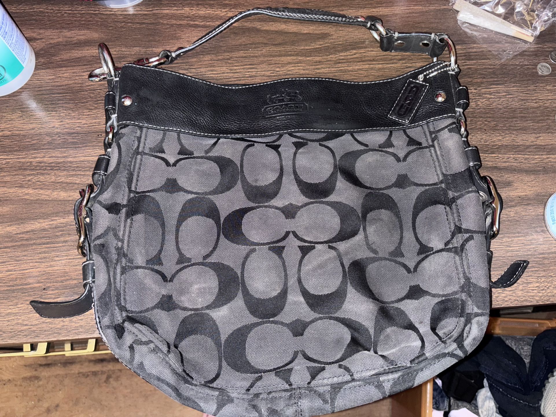 Coach Zoe Signature Hobo Bag.