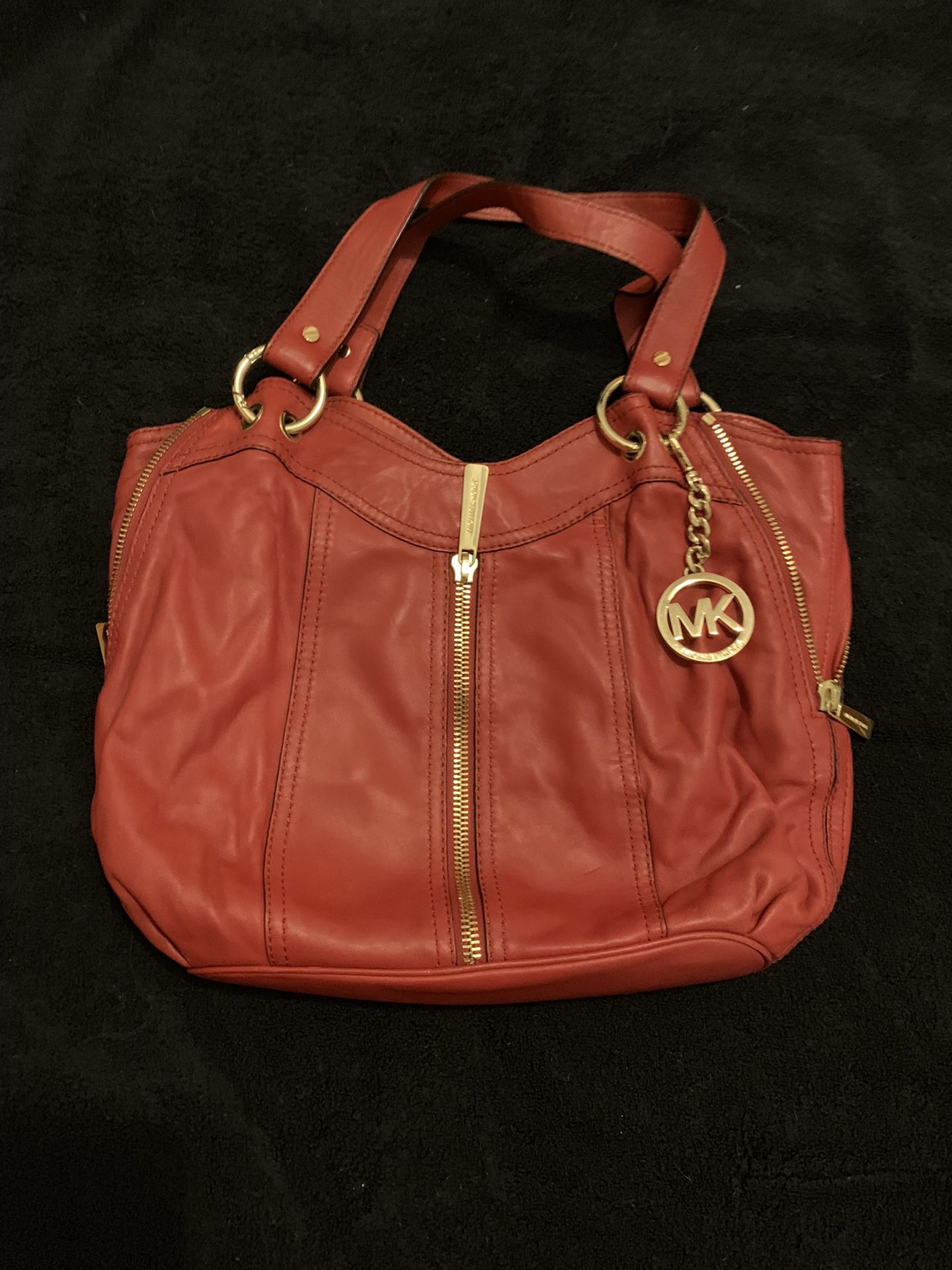 Michael Kors red patent leather handbag