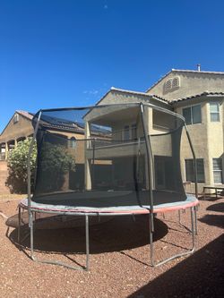 Large Round Trampoline with Safety Net – Good Condition
