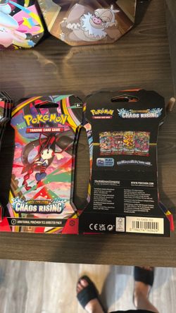 12$ each - Chaos Rising sleeved booster packs (10-card packs sleeves)